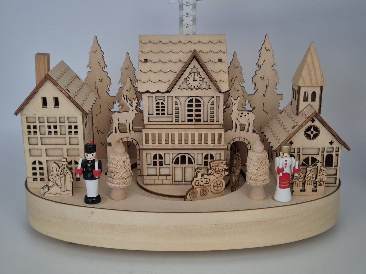 Beleuchtete Weihnachtsdorf - Spieluhr aus Holz mit Drehteller – Engel & Bergmann