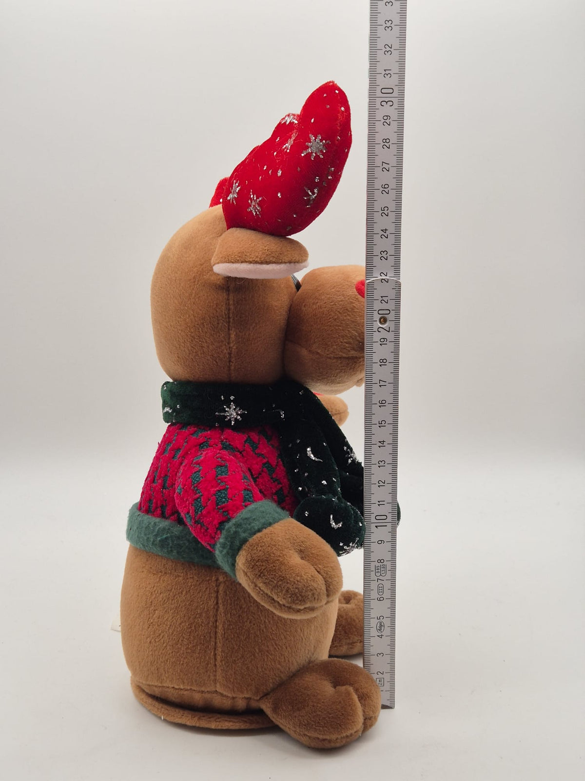 Singender Weihnachtselch aus Plüsch – ca. 30 cm