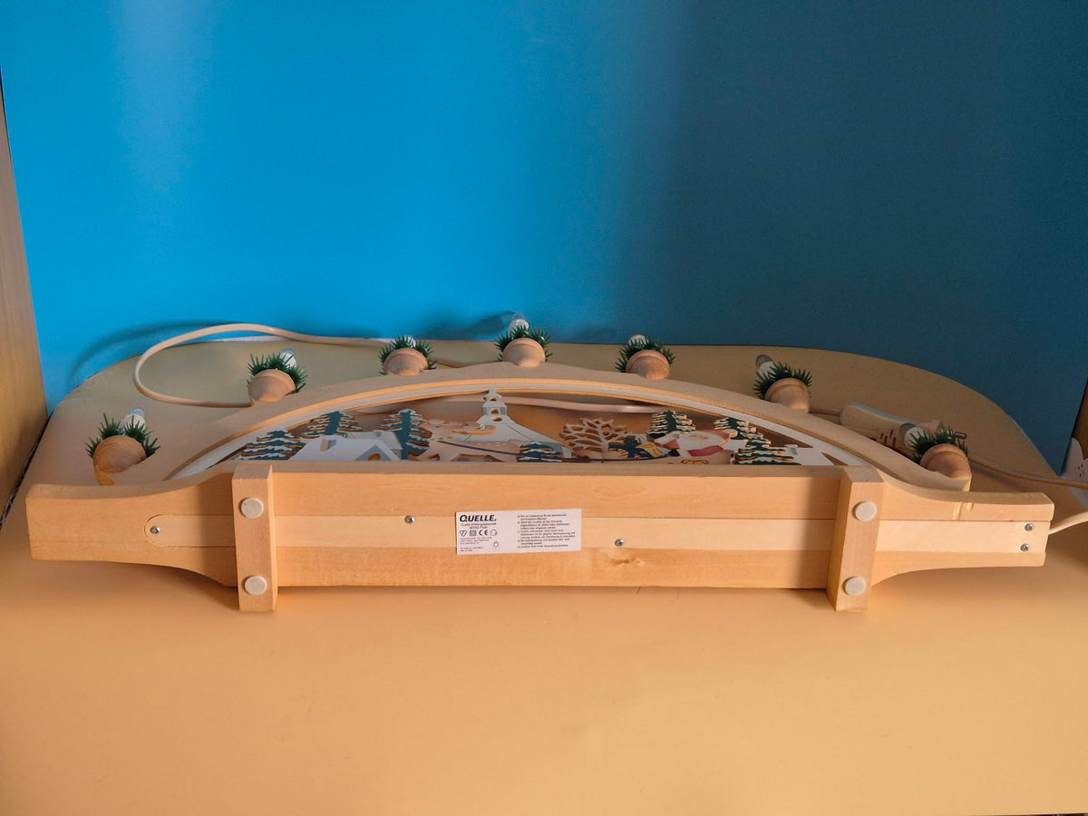 Elektrischer Holz-Schwibbogen – Weihnachtsmann mit Rentierschlitten – 7-flammig – ca. 59 cm