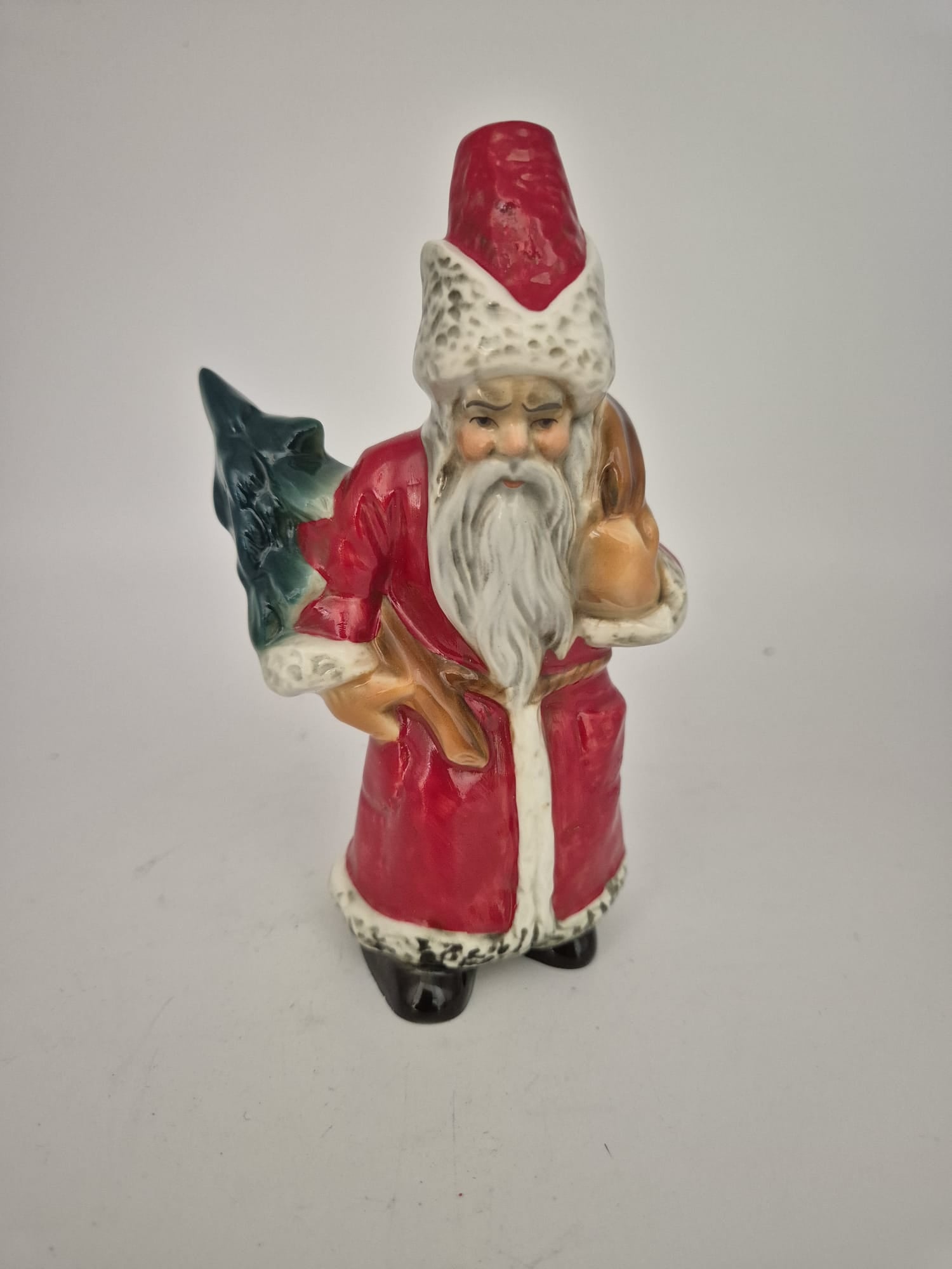 Porzellanfigur Weihnachtsmann mit Tanne