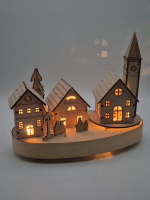 Holz-Spieluhr Weihnachtsdorf mit LED-Beleuchtung – spielt „Stille Nacht, Heilige Nacht“