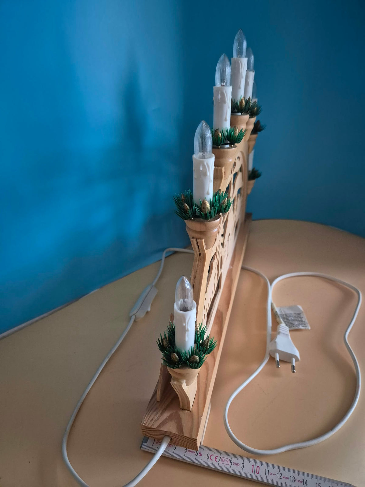 Hellum elektrischer Schwibbogen – Winterdorf mit Kurrende – 7-flammig – ca. 45 cm – OVP
