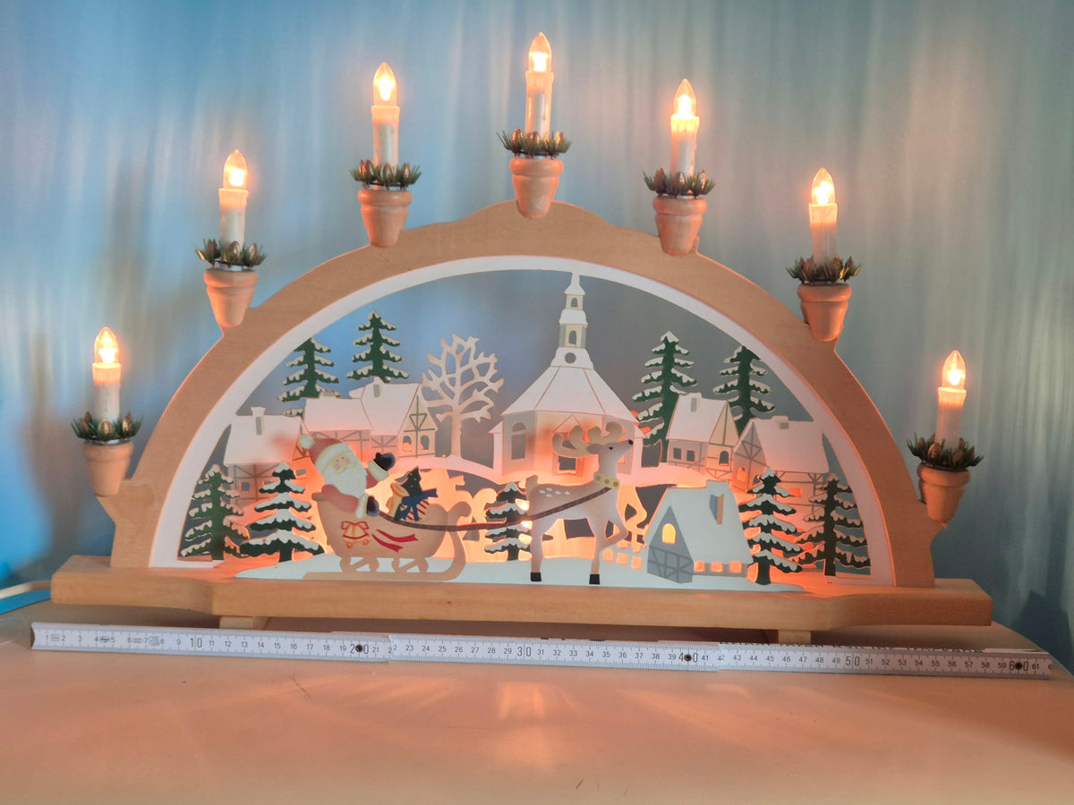 Elektrischer Holz-Schwibbogen – Weihnachtsmann mit Rentierschlitten – 7-flammig – ca. 59 cm